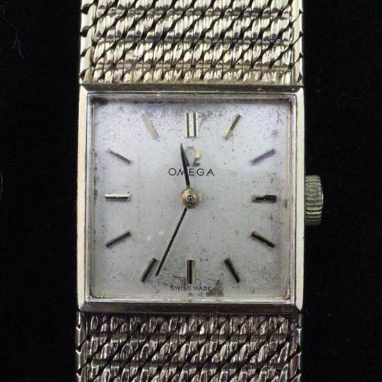 A ladys 1960s 9ct gold Omega manual wind wrist watch, with Omega box.